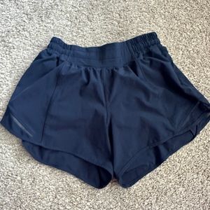 Lululemon Hotty Hot 4” size 4 True Navy Low Rise Lined Shorts